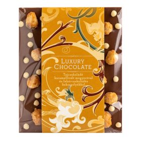 Tejcsokoládé karamellizált mogyoróval és kekszgolyókkal 65G   Tejcsokoládé karamellizált mogyoróval és kekszgolyókkal 65G